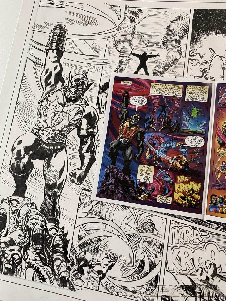 Photo by Reilly Brown. Of the inked page for Masters of the Universe Origins mini-comic "Eye of the Storm", and next to it the final printed mini-comic.